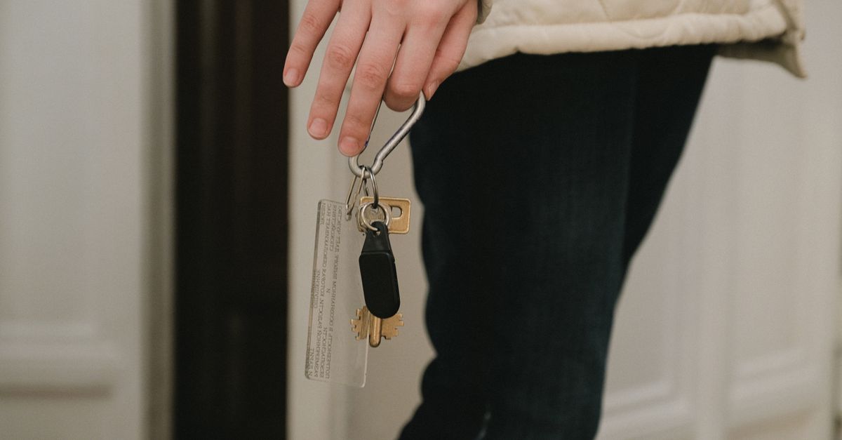 locksmith unlocking front door — Expert Locksmith Pros